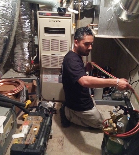 Mario Morales, founder of Wine Cellar Cooling Services San Francisco, is Welding the Refrigeration Lines for the Wine Cellar Beverly Hills Project